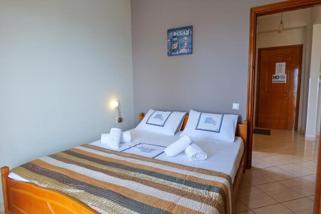 Fotografii Elidon Apartments апартаменты