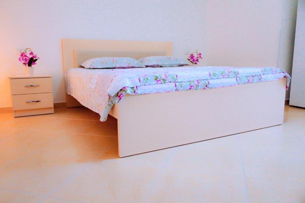 Картинка Erions Apartments апартаменты