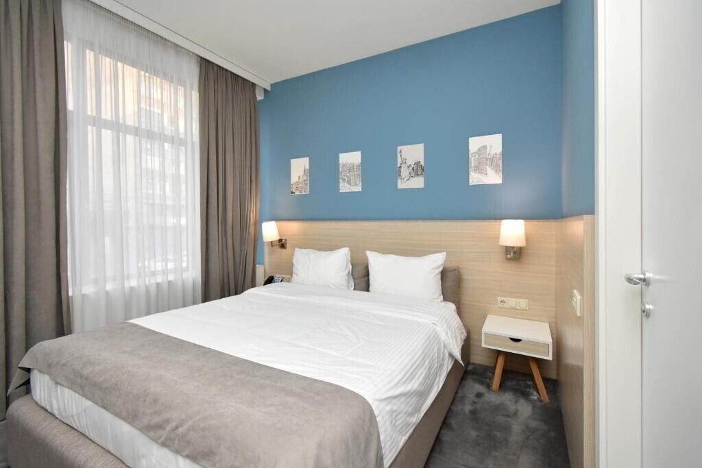 Fotografii In City Hotel 4*