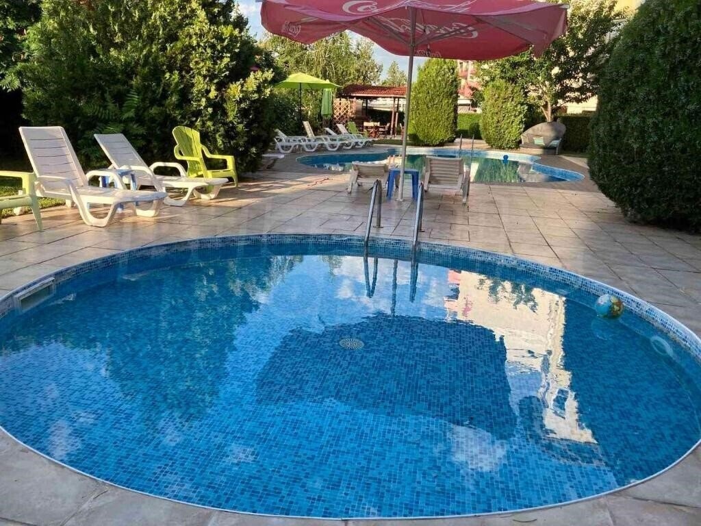 Fotografii Sunny Garden апартаменты