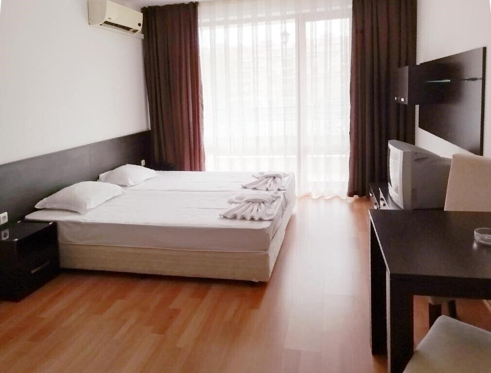 Фото Happy Aparthotel апартаменты