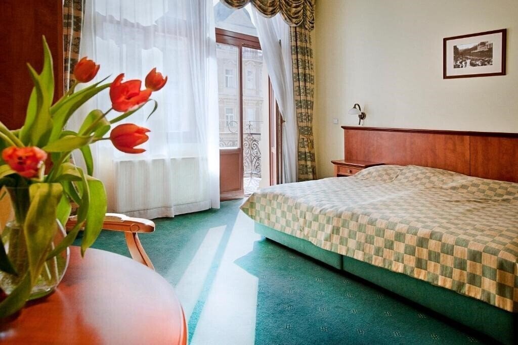 Отель Cajkovskij Palace 4*