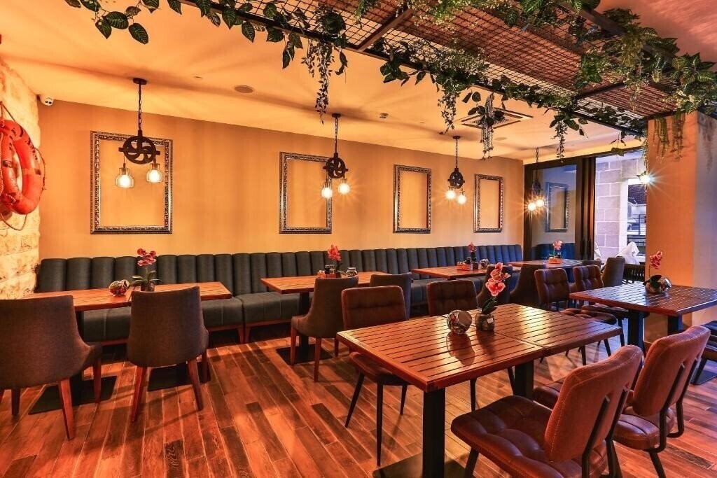 Imaginea Tate Hotel 4*