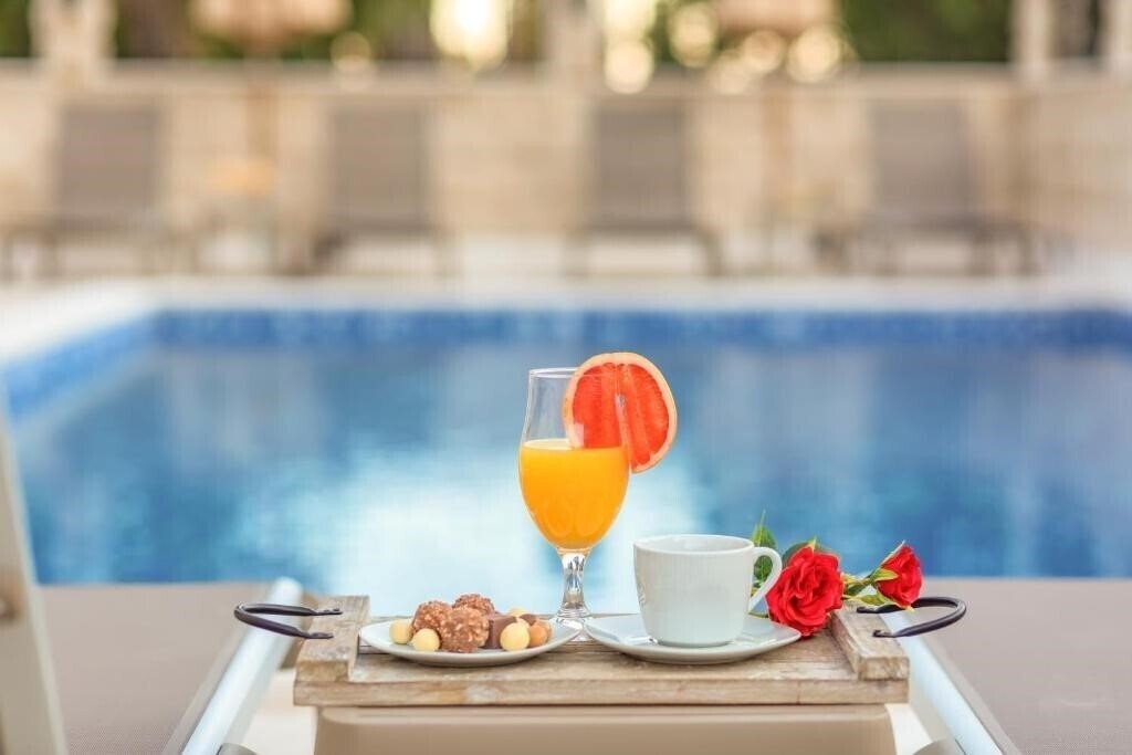 Fotografii Luxury Apartments Queen 4*