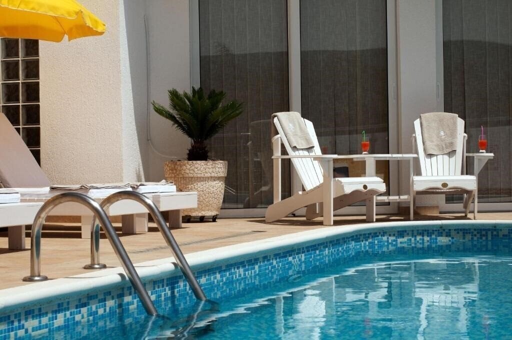 Imaginea Kamelija Apartments 4*