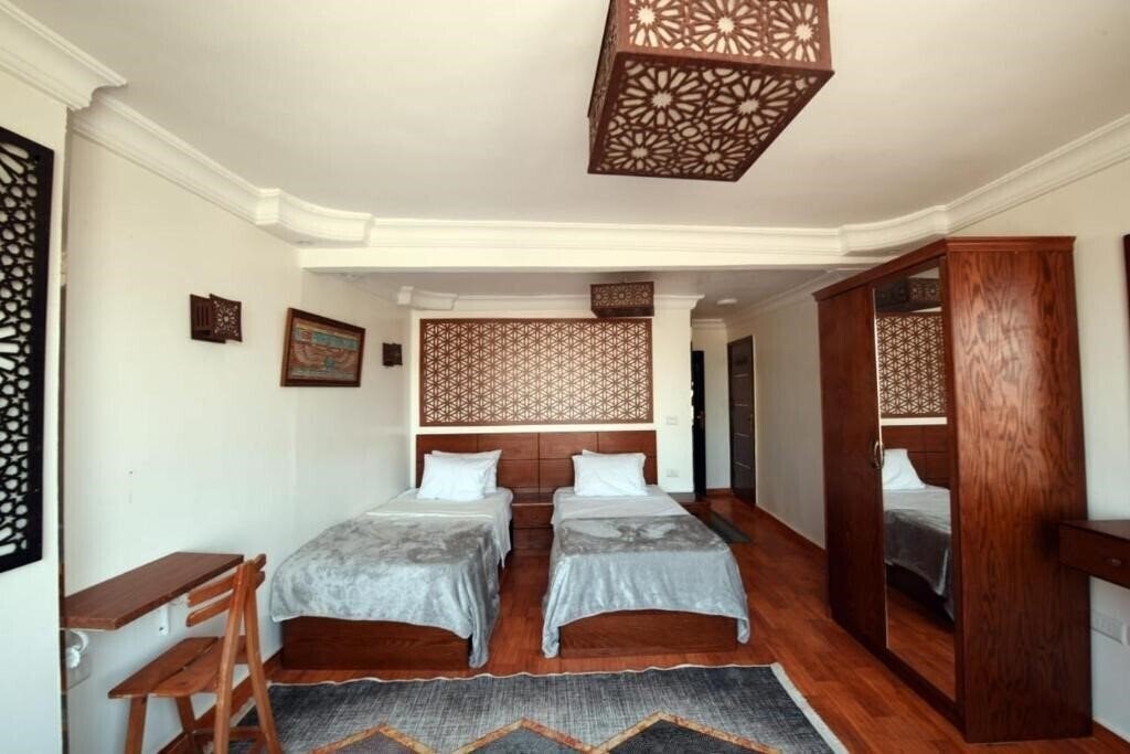 Imaginea 9 Pyramids Inn 3*