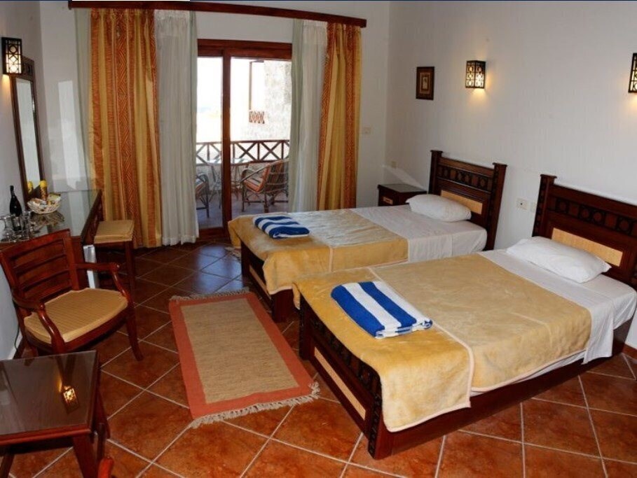 Fotografie The Oasis Dive Resort 3*