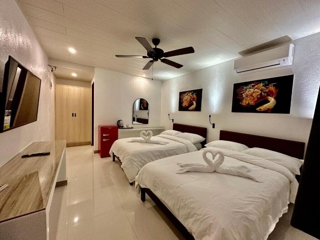Fotografii Calypso Beach & Dive Resort 3*