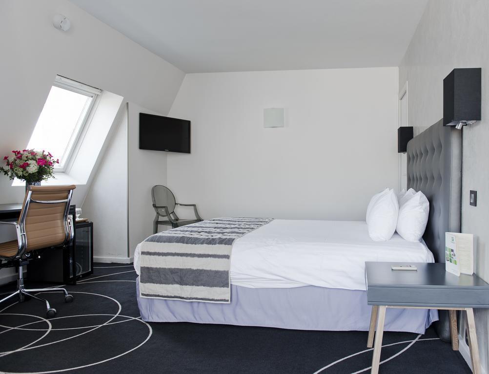 Fotografii Holiday Inn Paris Montparnasse Pasteur 4*