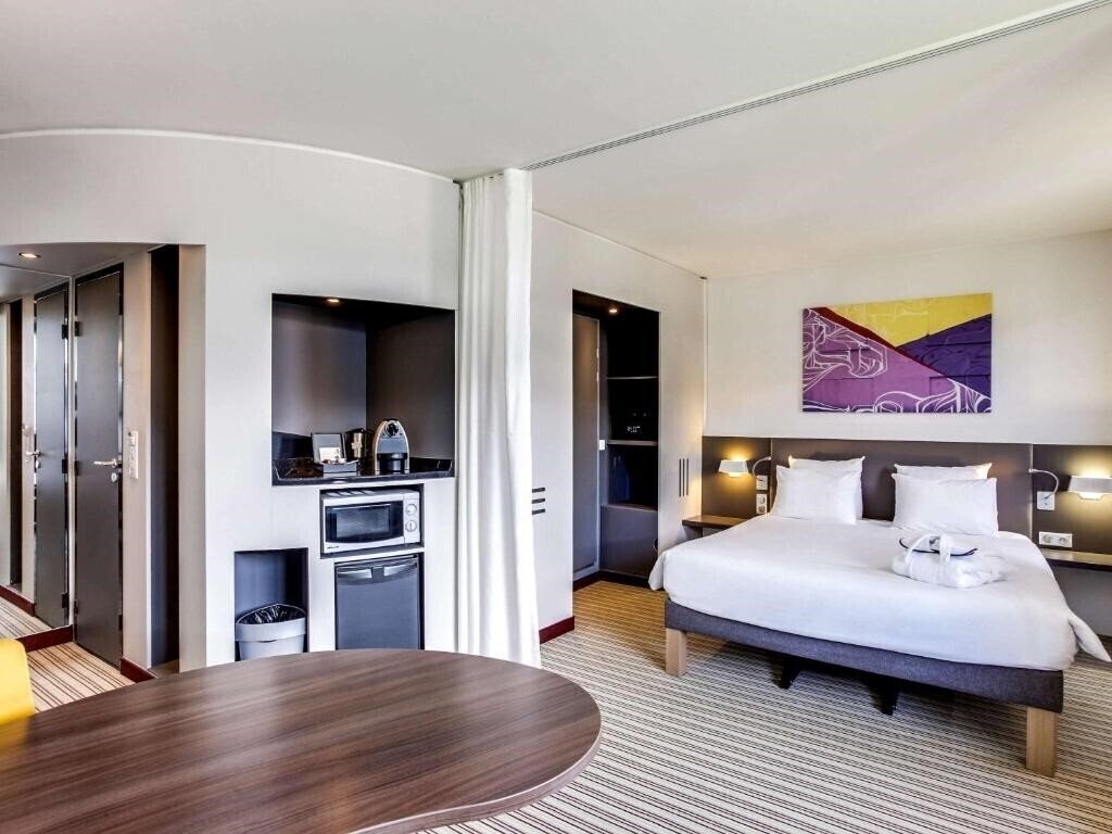 Фото Suite Novotel Paris Porte De Montreuil 3*