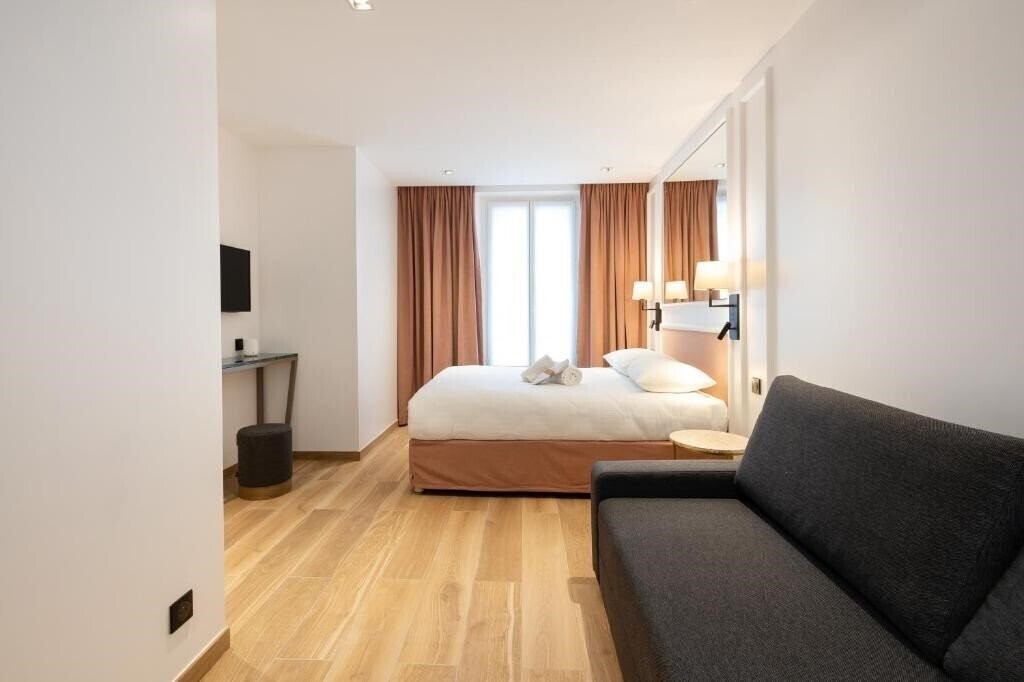 Imaginea Hotel Au Coeur de Republique 3*