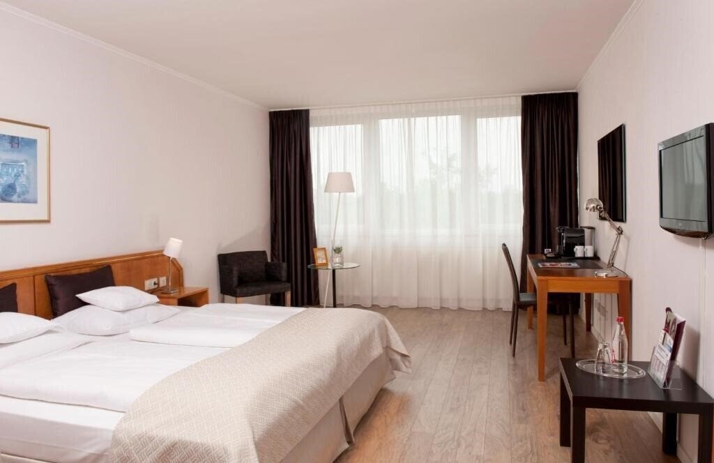 Отель Wyndham Hannover Atrium 4*
