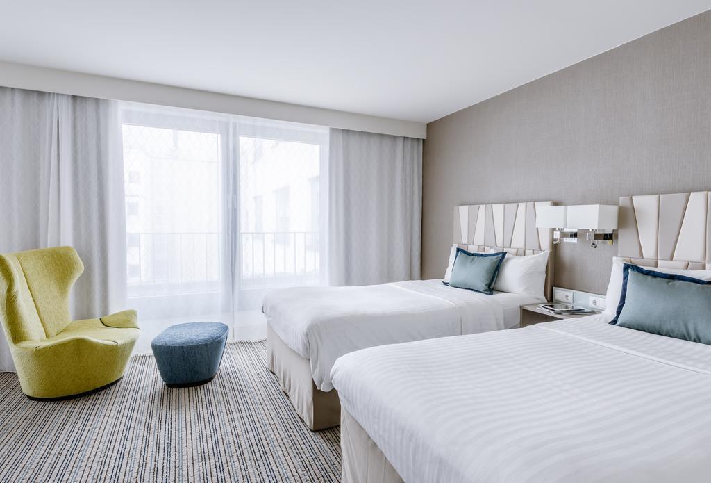 Imaginea Courtyard By Marriott Munich City Center 4*