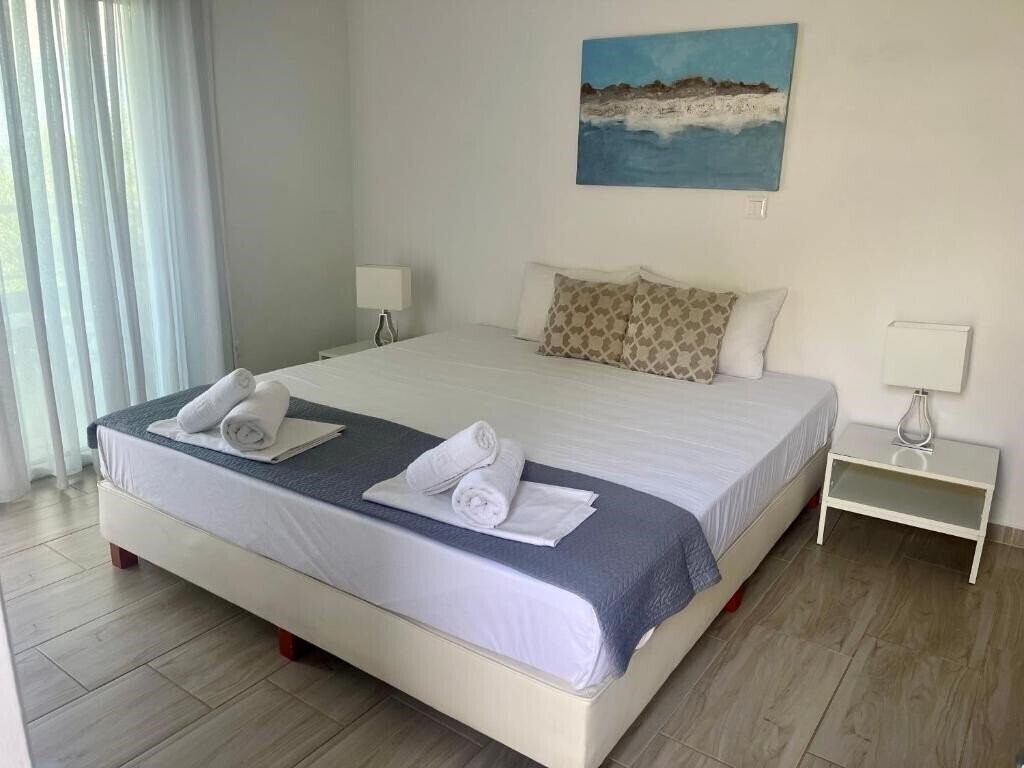 Фото The Beach House Apartments апартаменты