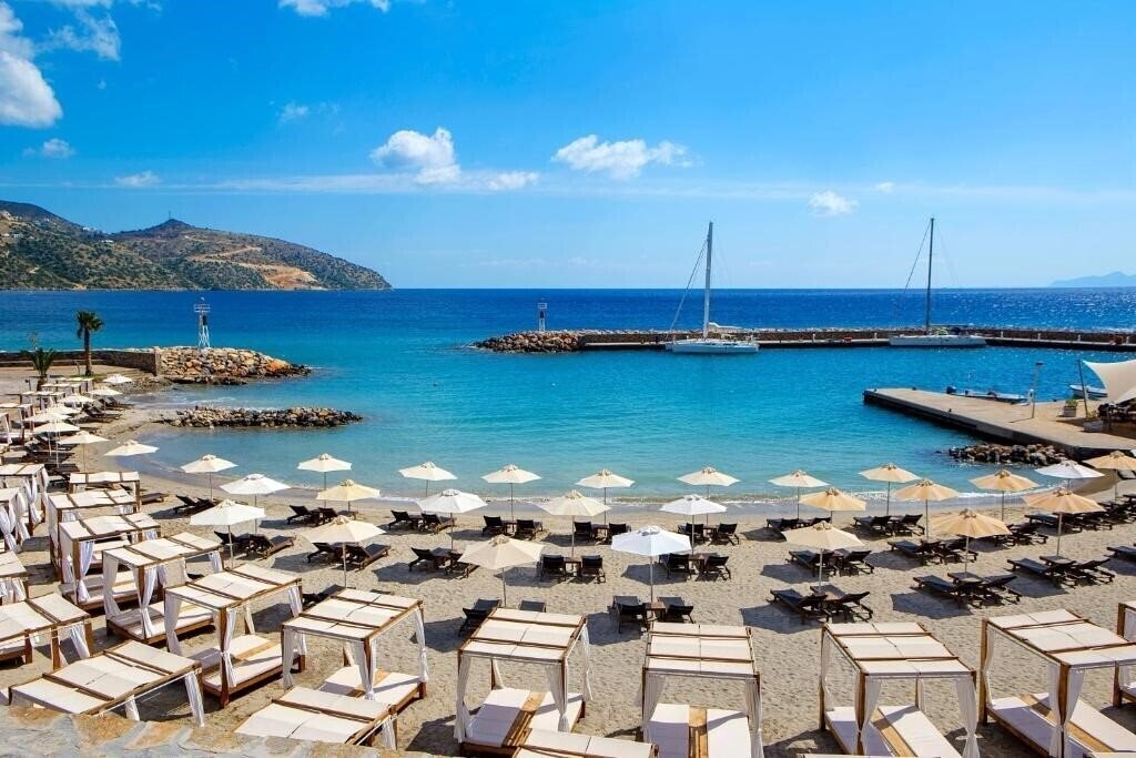 Fotografie Mirabello Bay Luxury Resort (ex. Wyndham Grand Crete Mirabello Bay, Mirabello Beach And Village) 5*