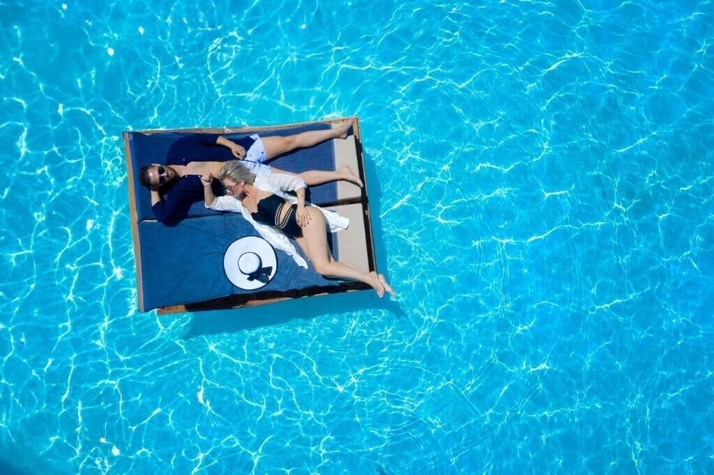 Imaginea Mirabello Bay Luxury Resort (ex. Wyndham Grand Crete Mirabello Bay, Mirabello Beach And Village) 5*