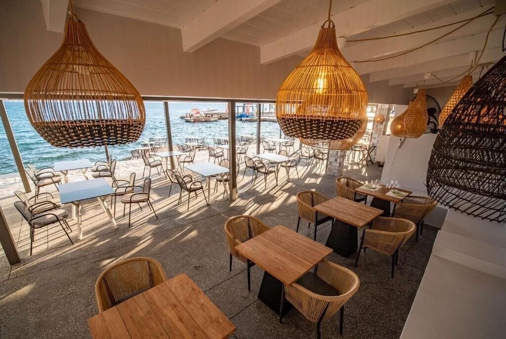 Изображение Wyndham Loutraki Poseidon Resort (ex. Ramanda Poseidon Resort, Poseidon Resort Hotel) 5*