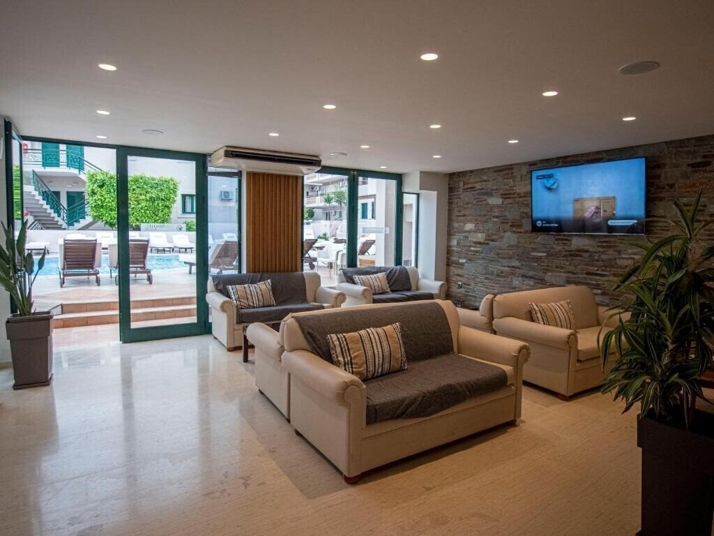 Fotografie Porto Greco Village Beach Hotel 4*