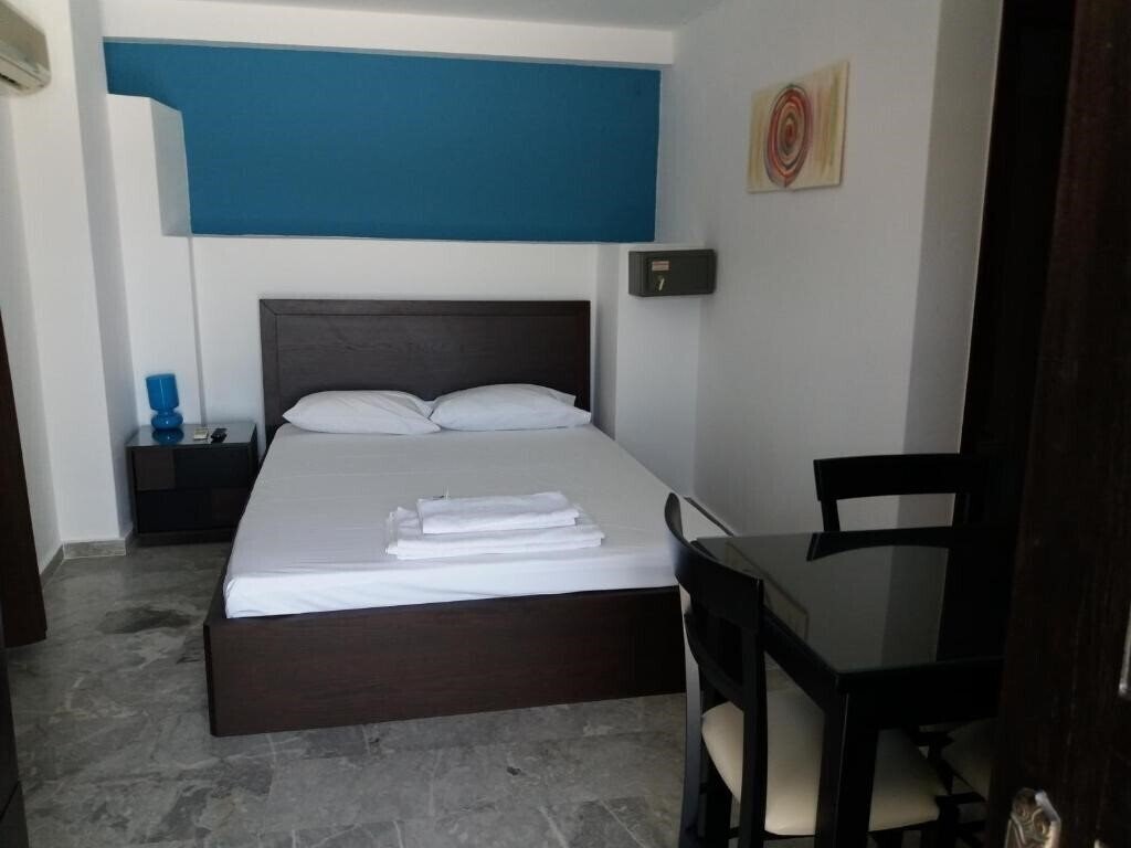 Imaginea Manos Apartments апартаменты
