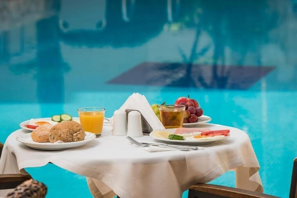 Imaginea Minos Village (Agia Marina) 2*