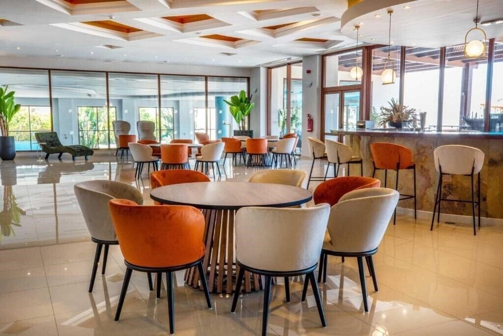 Imaginea Mythos Beach Resort 5*