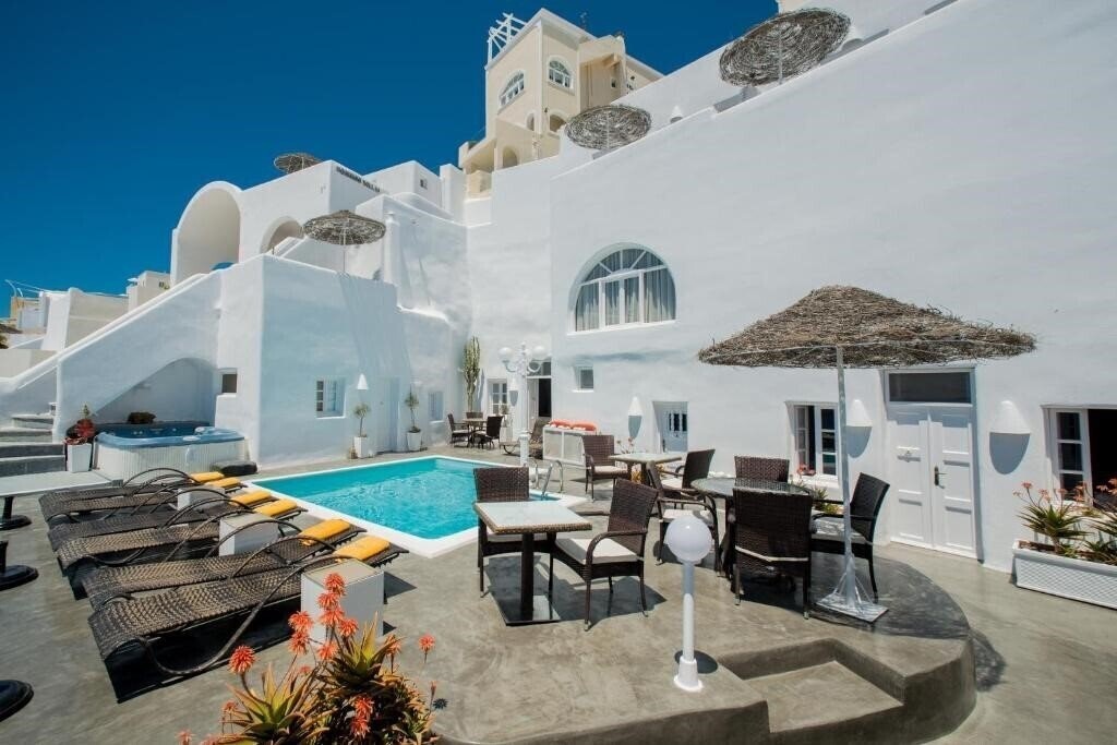 Imaginea Nomikos Villas 4*