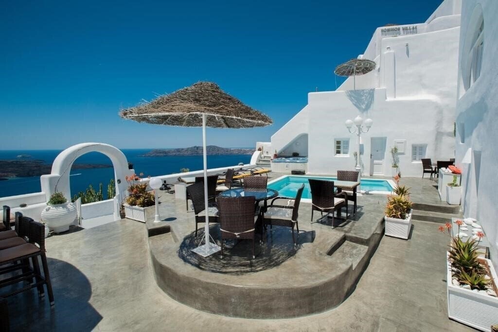 Imaginea Nomikos Villas 4*