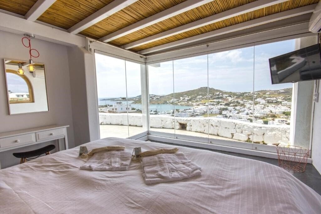 Fotografii Anixi Lounge Suites - Adults Only 3*