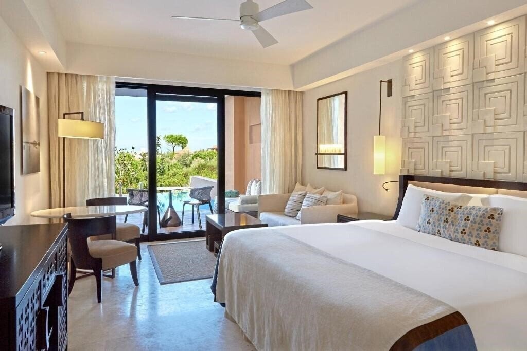 Fotografii The Romanos, A Luxury Collection Resort 5*