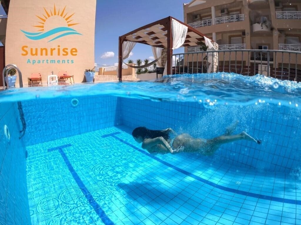 Отель Sunrise Studios & Apartments 3*