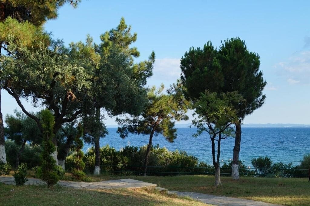 Imaginea Trikorfo Beach Maisonettes Apartments апартаменты