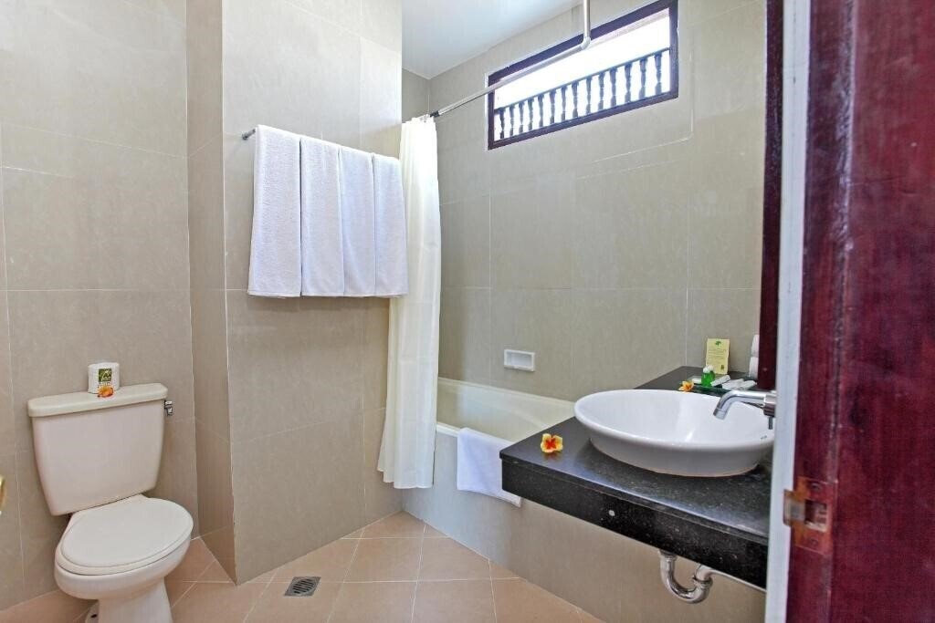 Fotografii Adi Dharma Hotel 3*