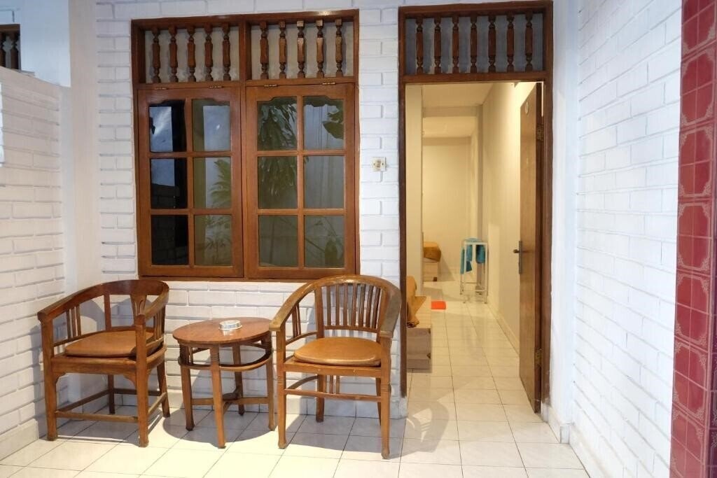 Фото Palm Garden Kuta Hotel 2*