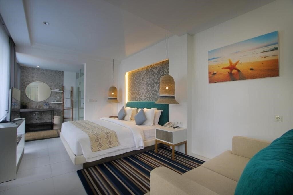 Фото Benoa Sea Suites And Villas 4*