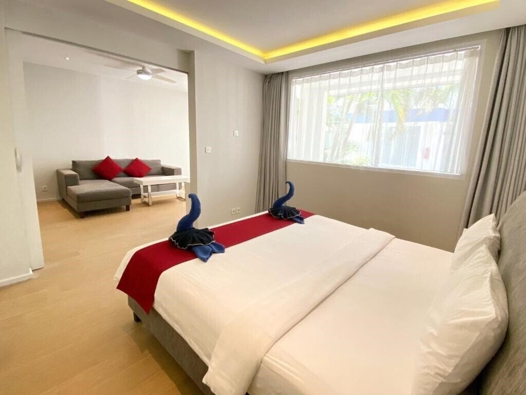 Фото Coast Boutique Apartments 3*