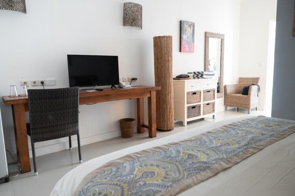 Картинка Scallywags Resort Gili Trawangan 4*