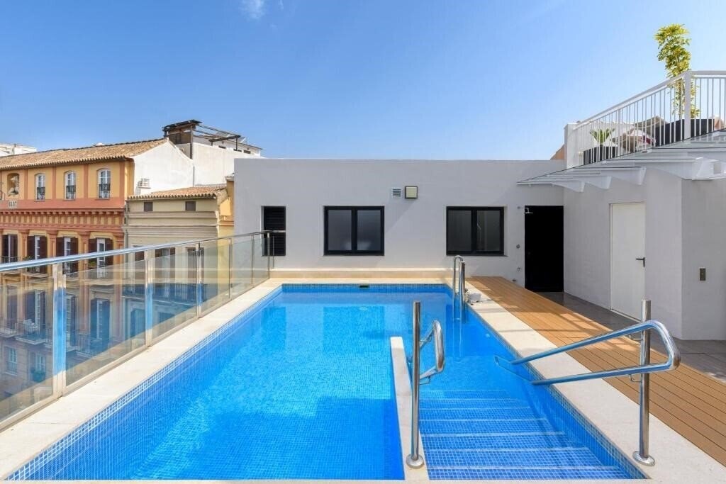 Отель Exe Malaga Museos 3*