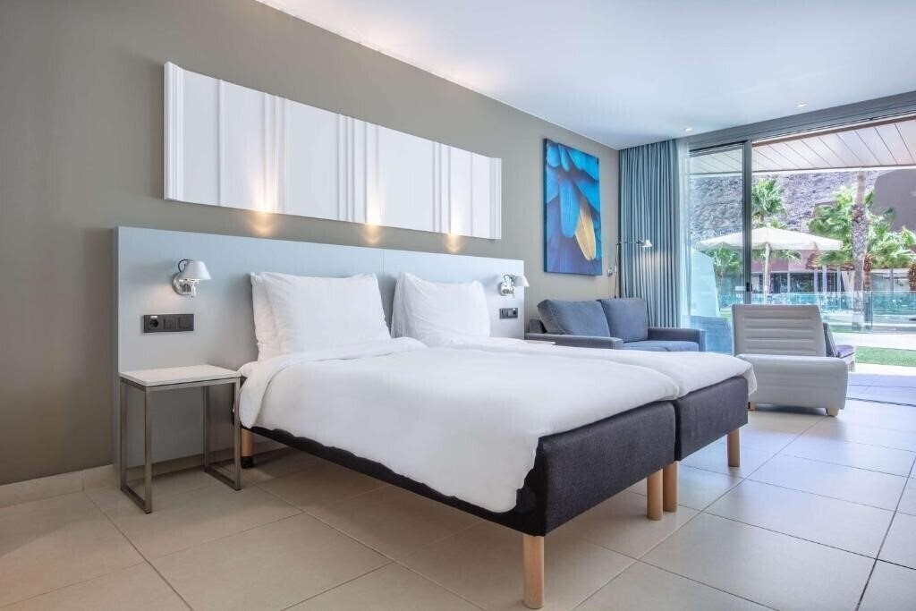 Imaginea Radisson Blu Resort & SPA Gran Canaria Mogan (ex. Radisson Blu Resort Mogan, Radisson Blu Resort & SPA ) 5*