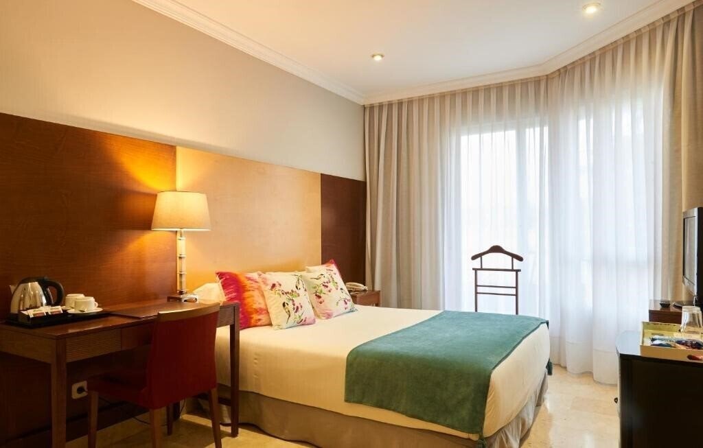 Фото Partner Barrio De Salamanca Suites 4*