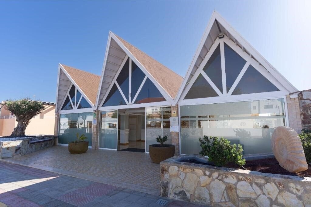 Fotografie Arena Suites апартаменты