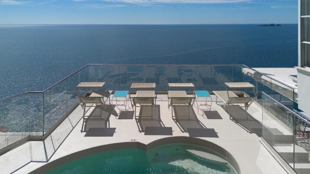 Фото Eden Roc Suites Hotel 4*