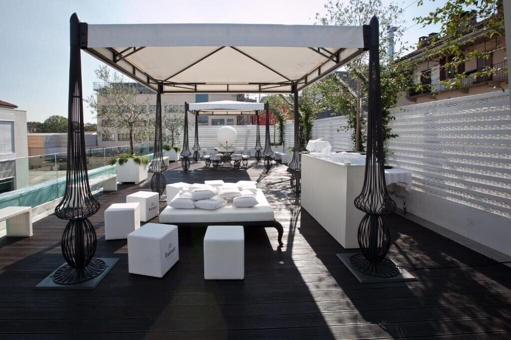 Фото Magna Pars Suites Milano 5*