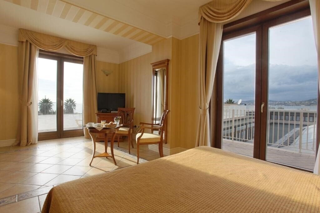 Фотография Dioscuri Bay Palace Hotel 4*