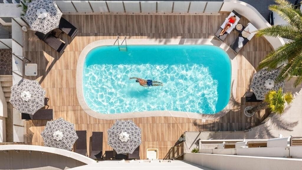 Фотография Suite Hotel Litoraneo 4*