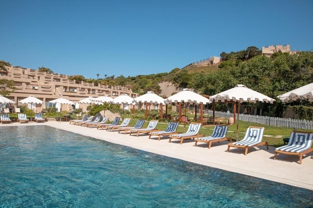 Imaginea Mangia's Sardinia Resort (ex. Marmorata Village, MClub Marmorata) 4*