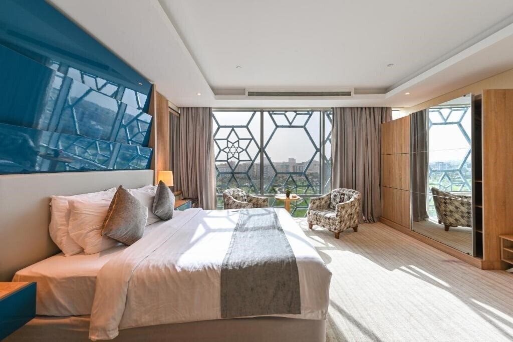 Отель Al Mansour Suites Hotel 4*