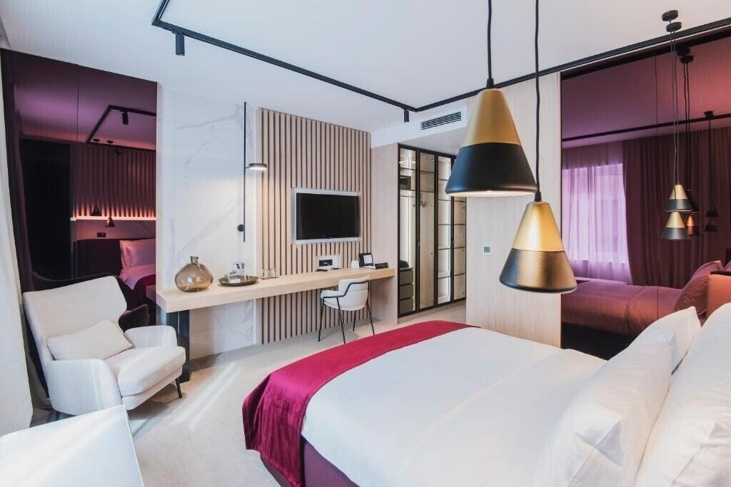 Fotografie Pod Zidom Rooms 4*