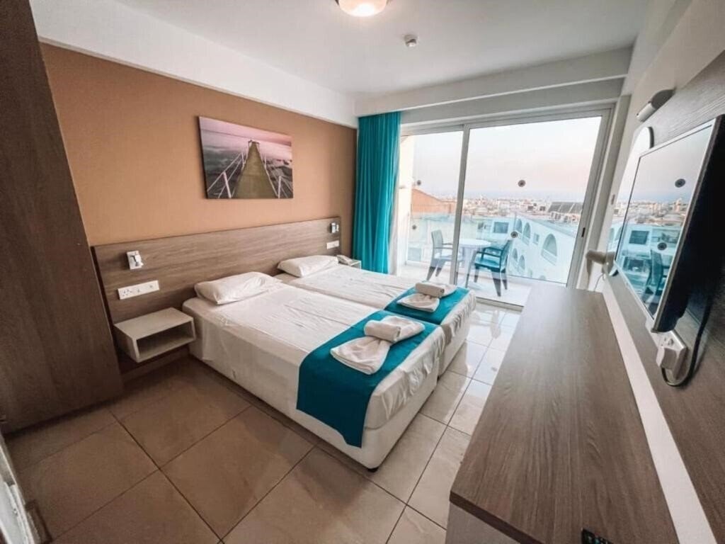 Фотография Sunny Blue Hotel 4*
