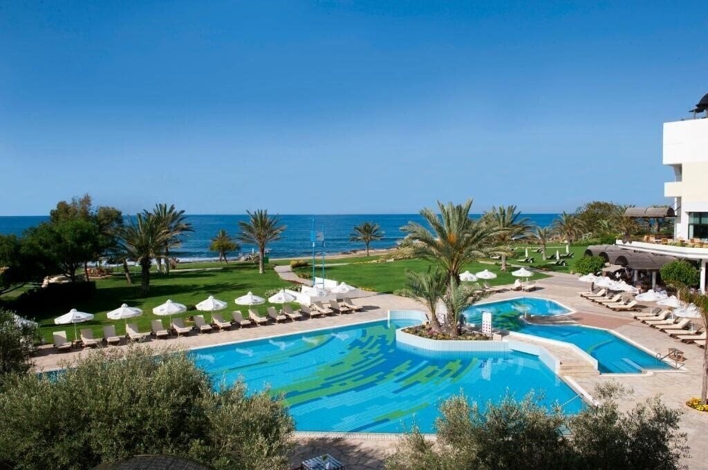 Фото Constantinou Bros Athena Royal Beach Hotel 4*