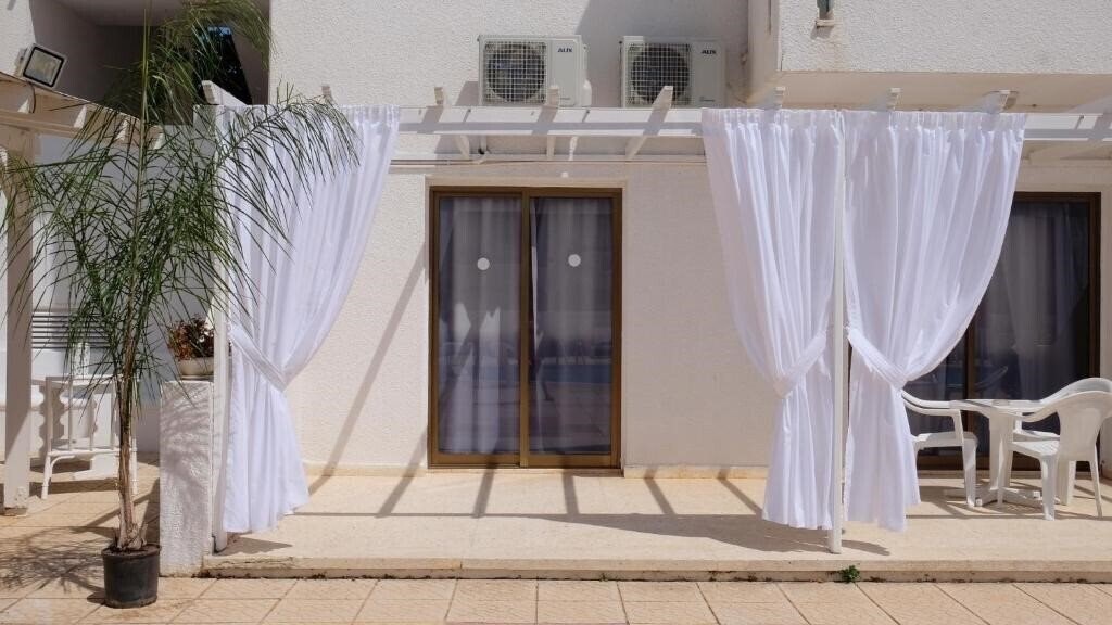 Imaginea Amore Hotel Apartments апартаменты